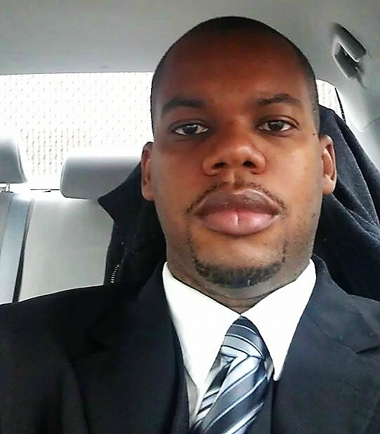 me in suit and tie in car